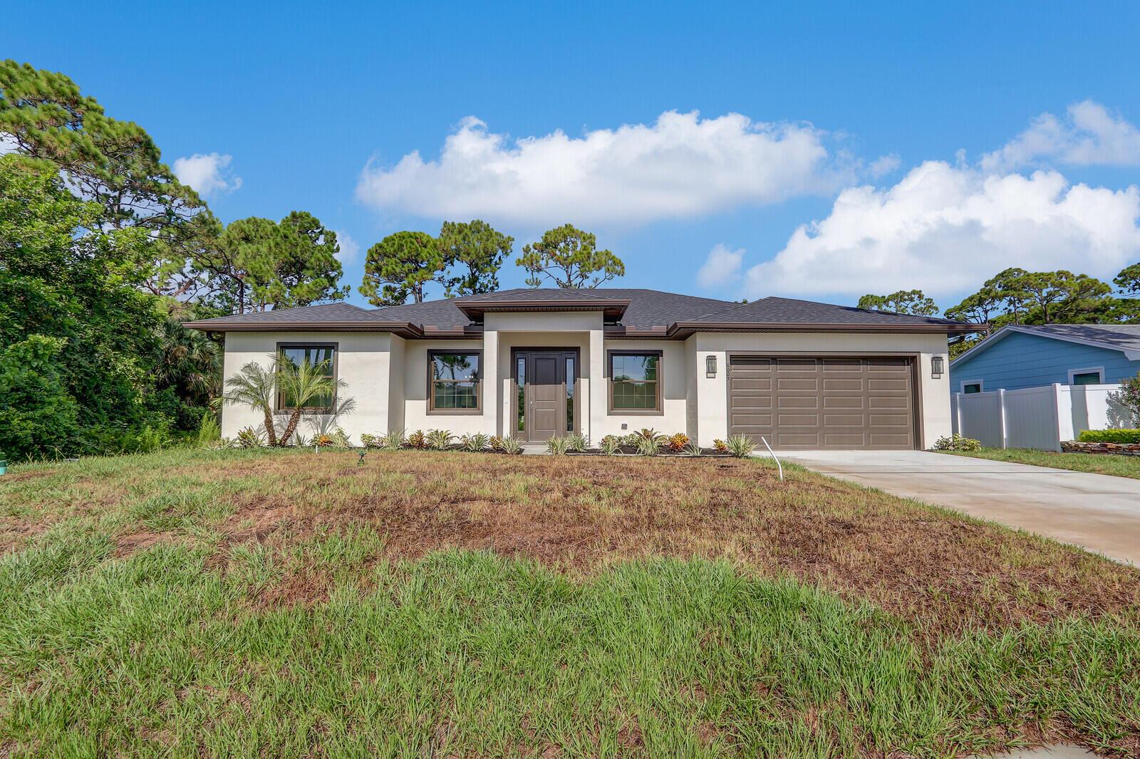 New Custom 60' Wide Ranch Style Home 3/3/2 w/2yr builder warranty in Indian River Estates. This thoughtfully designed home features 10' ceilings, walk-in closets, a private office, & private 3rd bedroom with bath & porch access. Kitchen offers soft-close 42'' cabinets, quartz tops, walk-in pantry with butcher block tops, & buyer can choose appliances with builder allowance! 5' soaking tub, tile to ceilings, & more. Includes gutters, screened porch coming soon (future outdoor kitchen ready), 8' French doors w/ mini blinds & 8' int. doors, electric fireplace, shiplap TV wall, impact windows, & CAT6 wiring. Big backyard-new sod coming & ready for a pool. Minutes from US-1 & the local park. Don't miss a chance to explore a home that blends beauty, style & privacy in one incredible package!