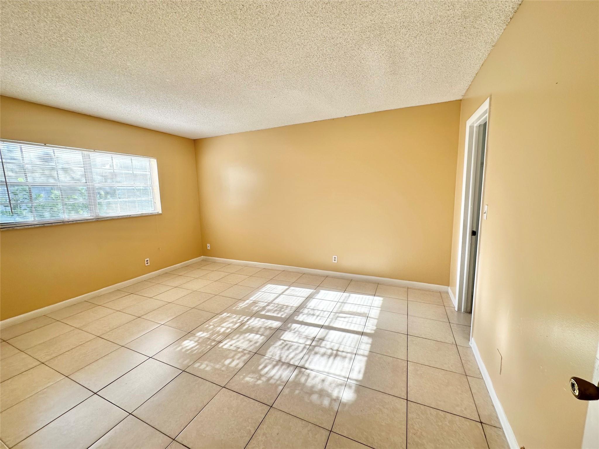 Great condo walking distance to downtown Coral Springs. The unit is on the ground floor and a corner unit offering more square footage and extra windows than other units in the building. Both bedrooms offer walk-in closets and are very spacious. There is plenty of storage with an extra walk-in closet off the main hallway. The condo is in a quiet building with only 14 units total and faces the pool. Right off the pool is an outdoor courtyard area with a BBQ Grill and a couple of tables. The building has two laundry rooms for your convenience. Rent includes water and trash.