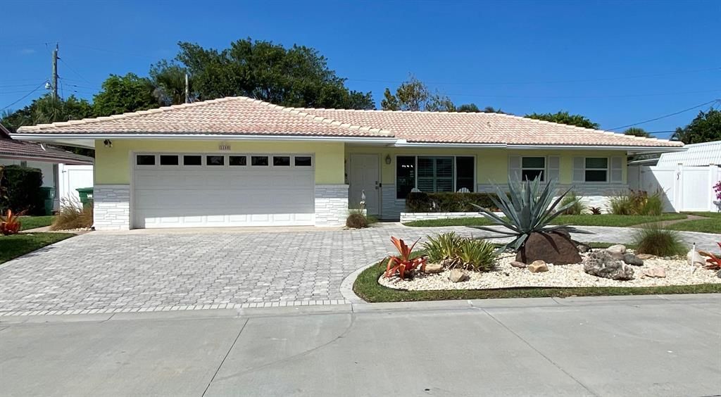 Photo of 1140 Singer Drive, Riviera Beach, FL 33404 (MLS # R10694442)