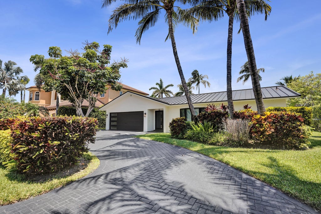 Photo of 933 Banyan Drive, Delray Beach, FL 33483 (MLS # B26049206)