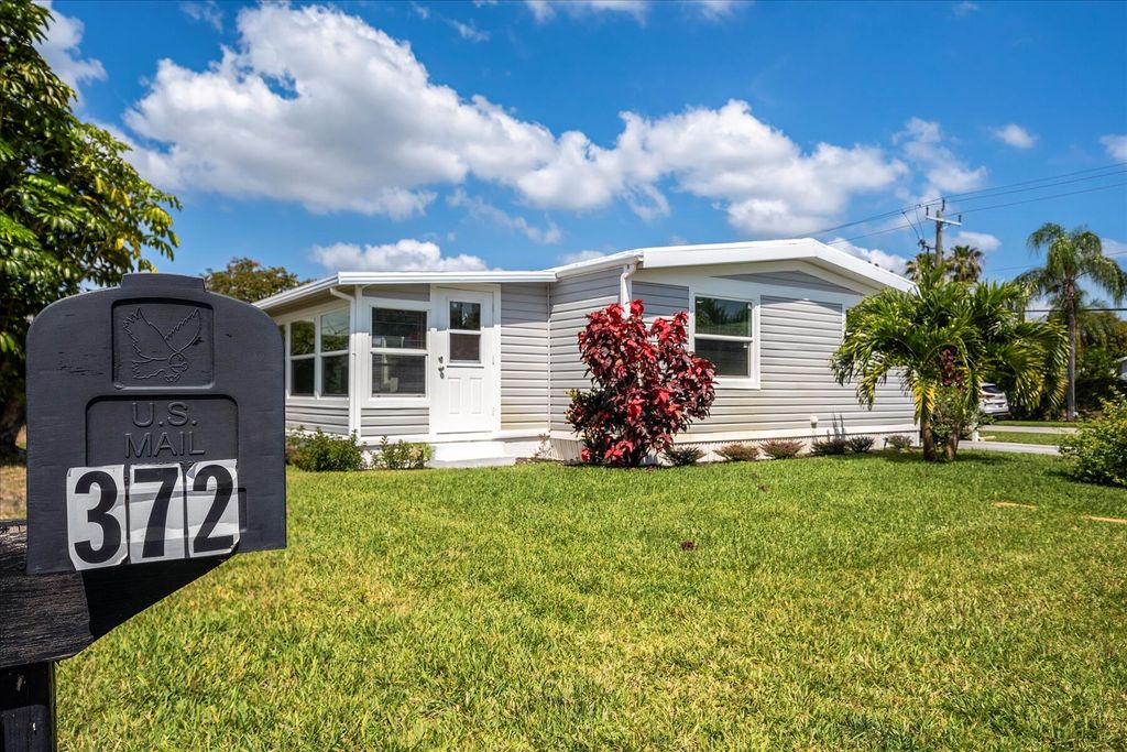 Photo of 372 NE Jade Circle, Jensen Beach, FL 34957 (MLS # R10980248)