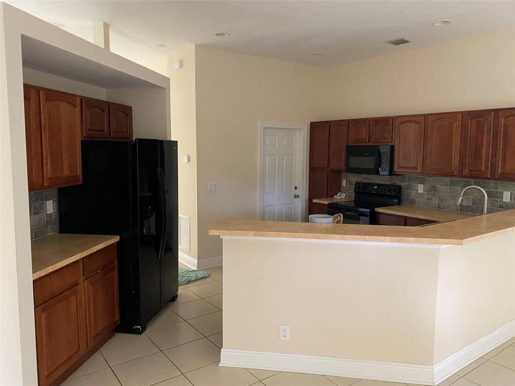 Photo of 120 SW Grimaldo Terrace, Port Saint Lucie, FL 34984 (MLS # F10464545)