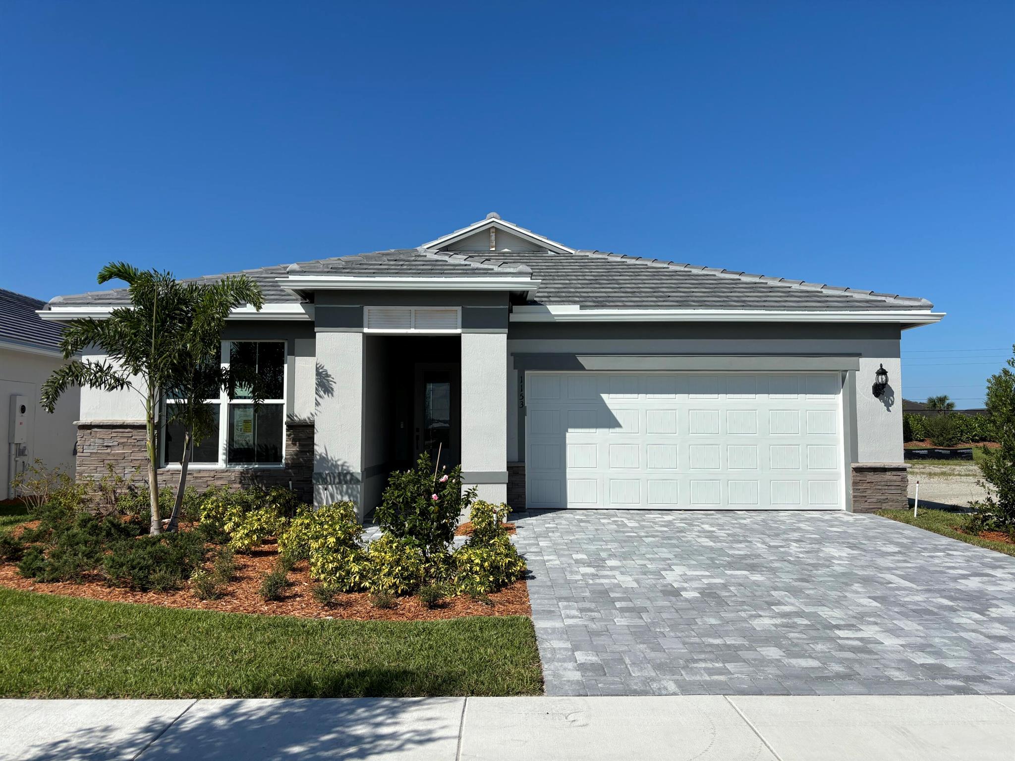 NEW CONSTRUCTION: Welcome to DiVosta's Newest Signature community in Vero Beach. Whether this is a winter getaway or your permanent address, the Palmary plan offers split bedrooms and enclosed den. Enjoy entertaining in the gracious Gathering room and impressive Buit in Kitchen with ample cabinets and welcoming island. Wood look tiles flow seamlessly through every room. Live mere steps from the world class Amenity Campus well underway for 2025 completion featuring a resort style pool, Pickleball and Fitness Center. Still not sure this community is the perfect fit? Take Advantage of Builder's FLY & BUY Program to pay for your trip!