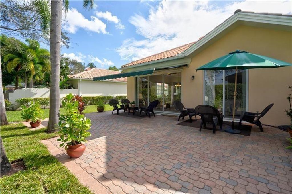 Photo of 4781 Temple Drive, Delray Beach, FL 33445 (MLS # R10940644)