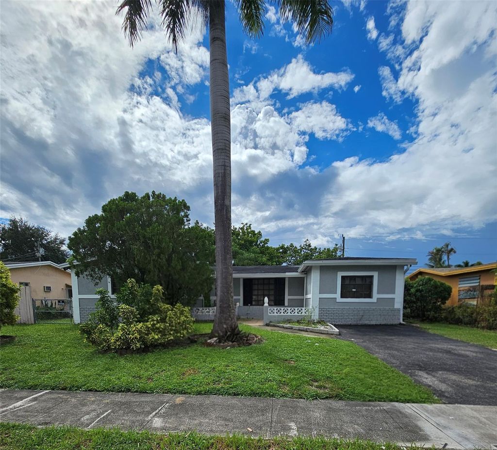 Photo of 3951 NW 36th Avenue, Lauderdale Lakes, FL 33309 (MLS # F10535433)