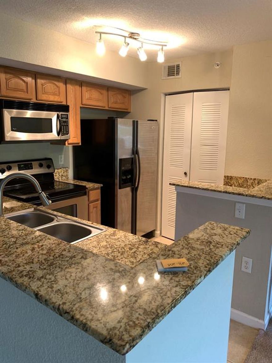 Wonderful 2nd floor condo with Upgraded Granite Counter Tops in Kitchen and both Baths.  Balcony off the Living Area.  Located in heart of Port St Lucie West.  Move in Ready.