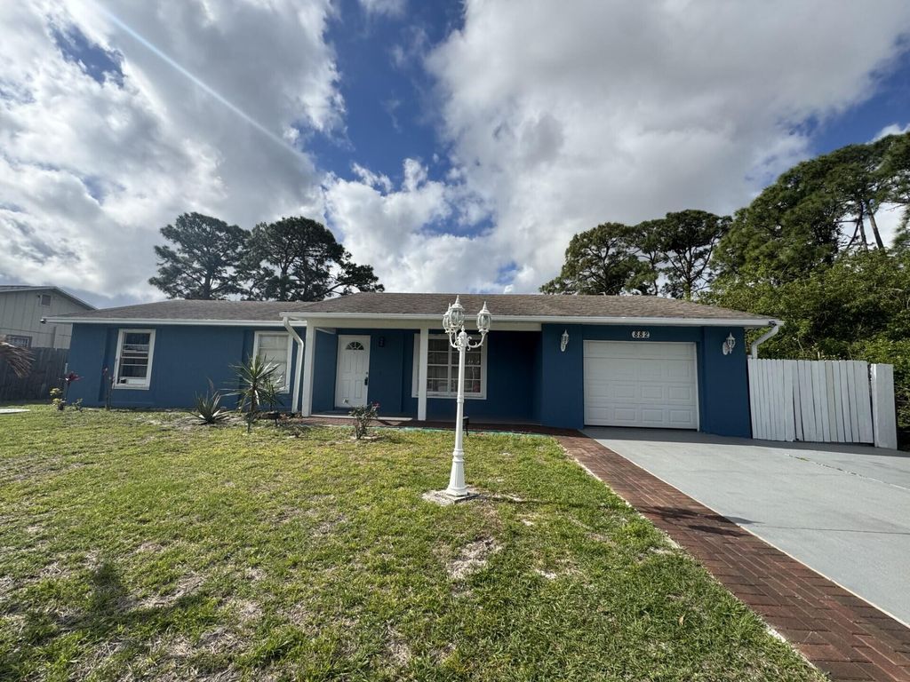 Photo of 882 SE Walters Terrace, Port Saint Lucie, FL 34983 (MLS # R11154788)