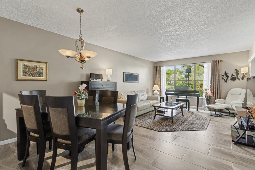 Photo of 2307 S Cypress Bend Drive #106, Pompano Beach, FL 33069 (MLS # F10542615)