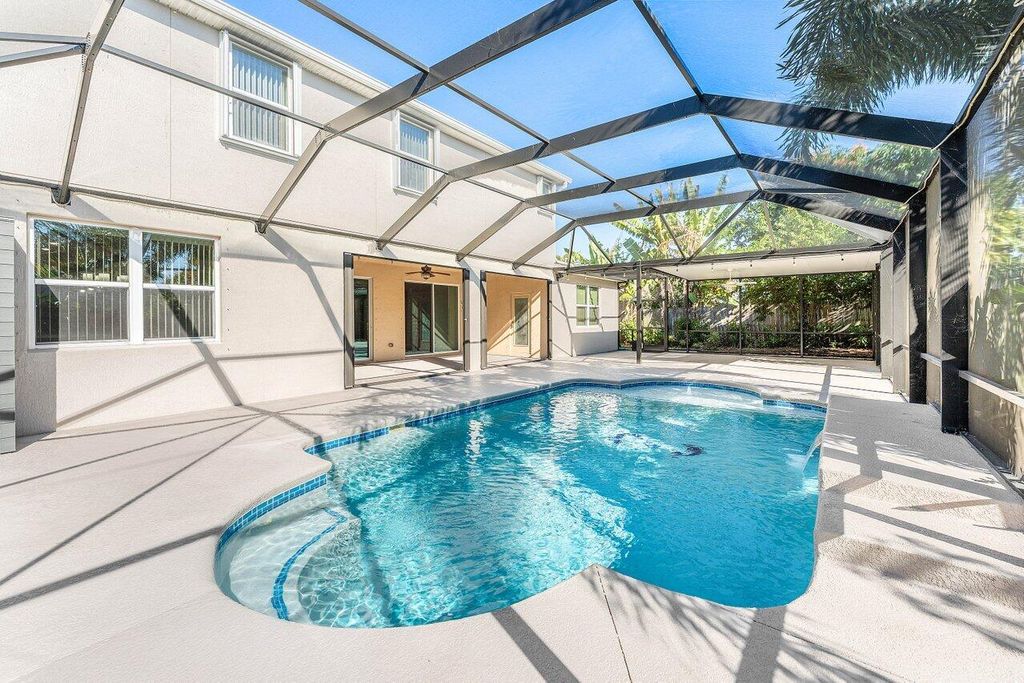 Photo of 1842 SW Lofgren Avenue, Port Saint Lucie, FL 34953 (MLS # R11150523)