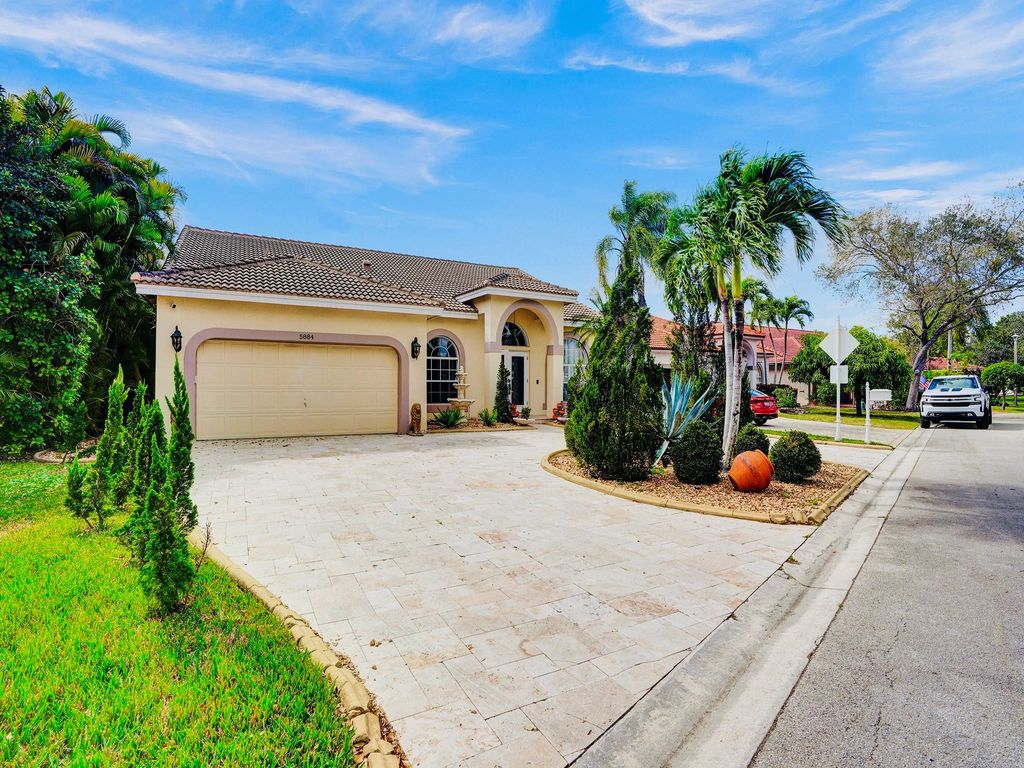 Photo of 5884 NW 74th Street, Parkland, FL 33067 (MLS # F10419167)