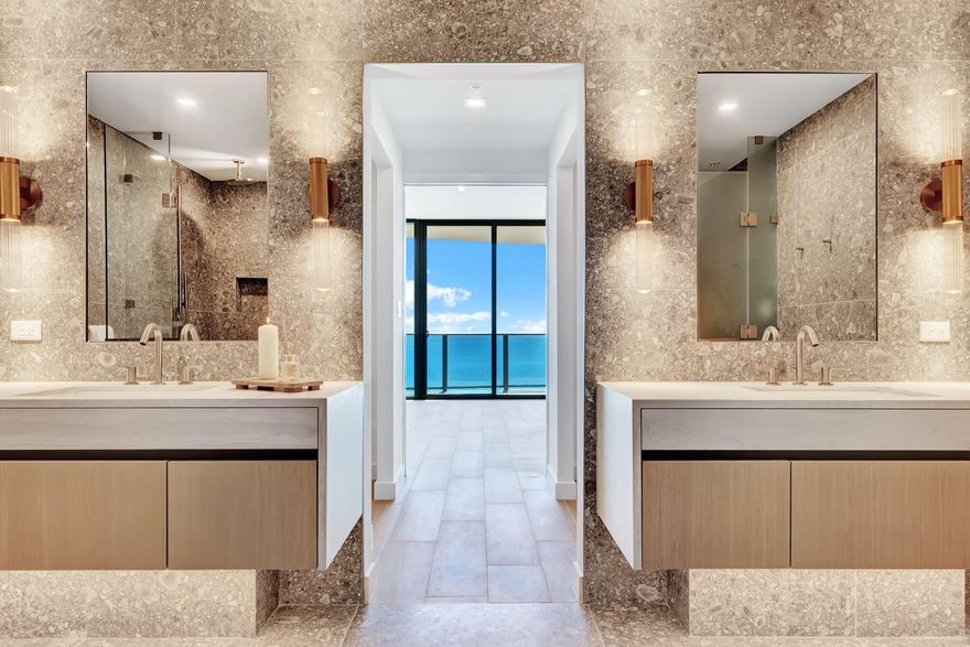 Casamar Residence 1401 in Pompano Beach presents the most luxurious direct southeastern oceanfront views. Step from the private elevator landing into the foyer of this 4-bedroom, 4.5-bath flow-through corner residence with den, boasting 3,390 SF and floor-to-ceiling windows that frame breathtaking Atlantic Ocean vistas. Outdoors, enjoy the tranquil sound of the waves from 1,290 SF of wraparound private terrace space. Residence 1401 features a spectacular family/dining room, spacious den, and a gourmet kitchen with Italian cabinetry, Sub-Zero/Wolf, Asko, and Electrolux appliances, plus a gas cooktop and island ideal for casual dining.