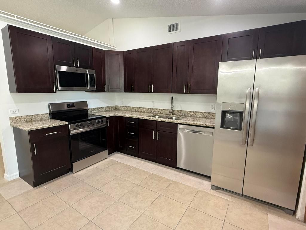 Photo of 1888 SW Angelico Lane, Port Saint Lucie, FL 34953 (MLS # R11116478)