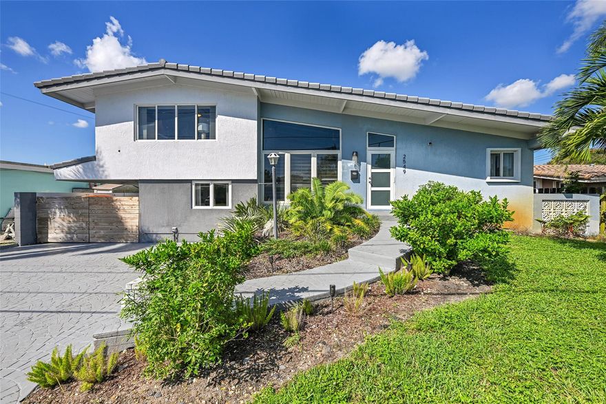 Welcome to your slice of paradise! This stunning 3 bedroom, 3 bathroom waterfront home offers year-round resort style living with large in-ground pool, private putting green and covered outdoor lounging and dining areas. In the highly sought after neighborhood of Lauderdale Isles, this home features a 50-foot dock included with your rental on an ocean access canal with no fixed bridges to the Intracoastal waterway and Atlantic Ocean. Split level design with over 1500 sq ft of living space, high ceilings, stainless steel appliances and ample parking. Hidden away from the hustle and bustle yet conveniently located just minutes from shopping, dining, entertainment and highway. Professional pool maintenance and lawn care covered by landlord at no additional cost. Choice of furnished or not.