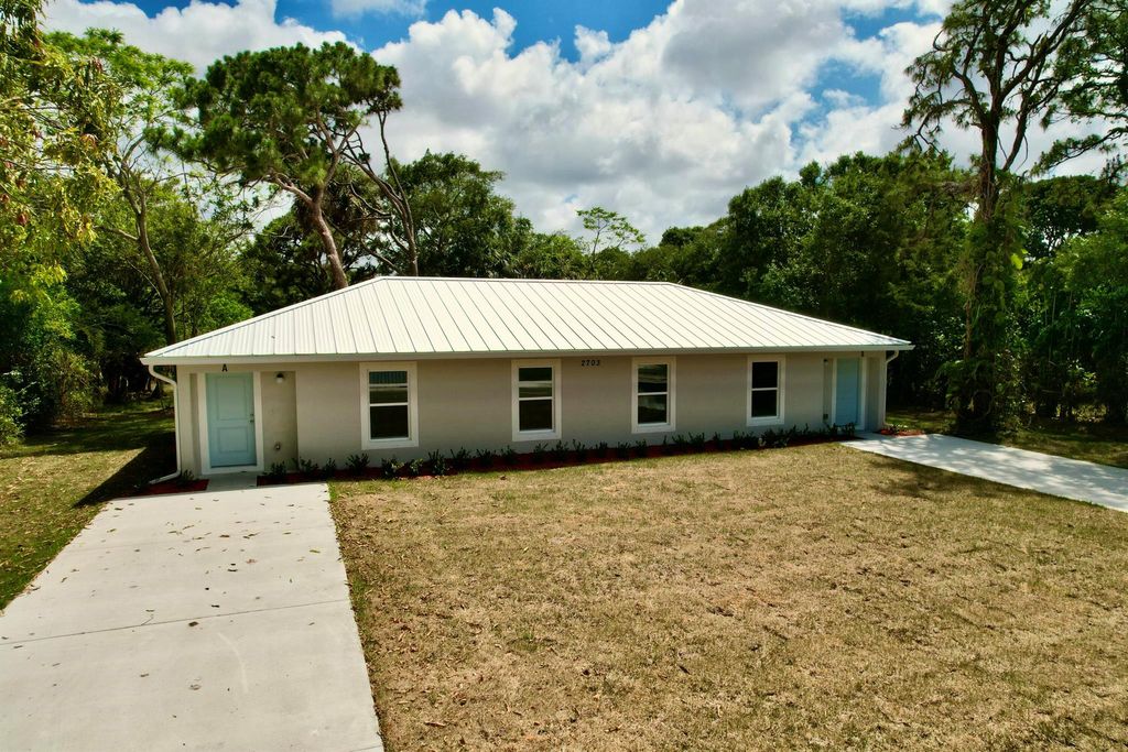 Photo of 2703 Avenue G, Fort Pierce, FL 34947 (MLS # R11121897)