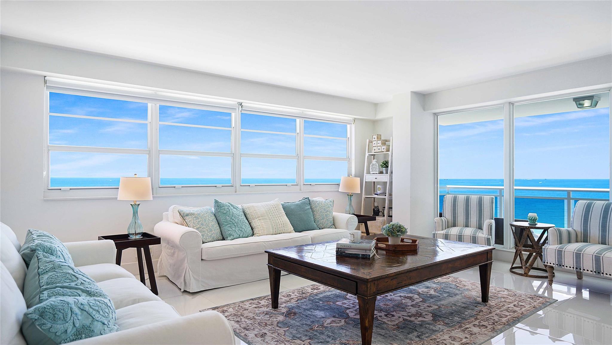 RARE Direct Oceanfront SE Corner on the Galt Ocean Mile! Bask in breathtaking, unobstructed ocean views from every room in this exceptional SE-facing residence at The Commodore. This bright and spacious unit is one of the few offering two private balconies — one facing directly east and the other southeast — providing endless Atlantic vistas and sunrise panoramas. Enjoy the convenience of an in-unit washer and dryer, an underground assigned parking space. The Commodore offers resort-style amenities including a fitness center, clubhouse/community room, beachfront cabanas, and secure underground parking. Live where others vacation — just steps from the sand with restaurants, shops, and cafes nearby. Don't miss this rare opportunity to own a piece of direct oceanfront paradise on the Galt!