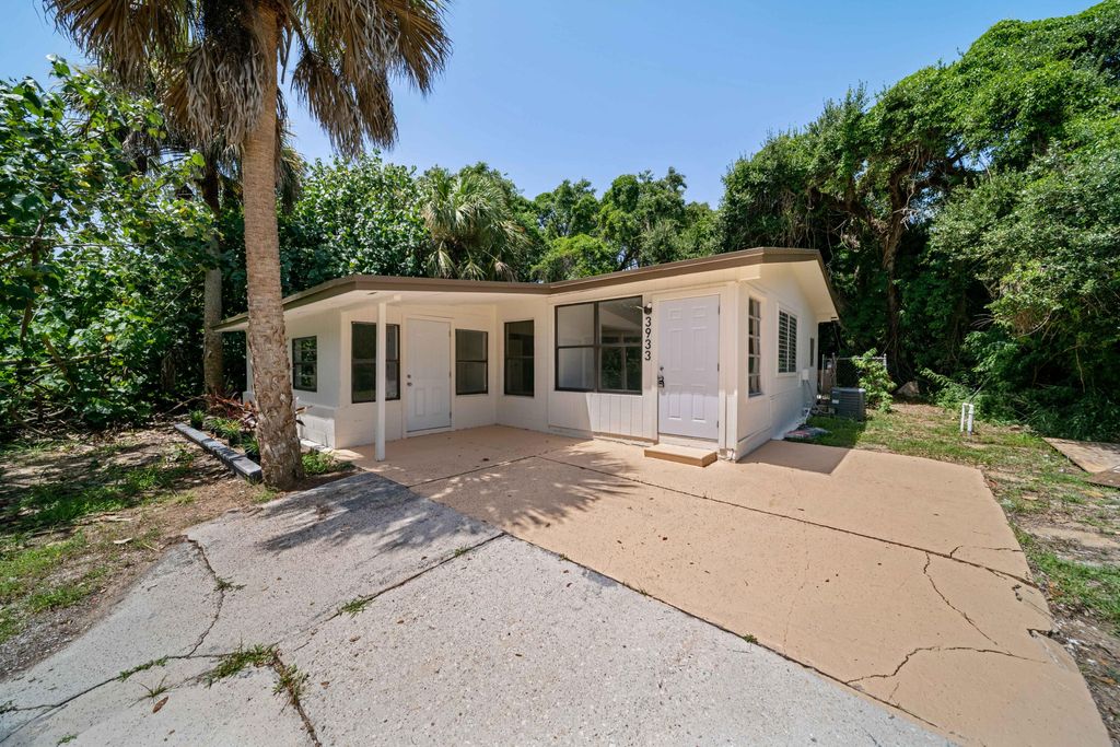 Photo of 3933 Old Dixie Highway, Fort Pierce, FL 34946 (MLS # R10827111)