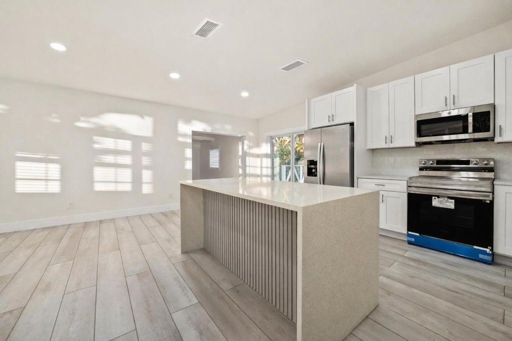Photo of 6934 Tradewind Way, Lake Worth, FL 33462 (MLS # R11154474)