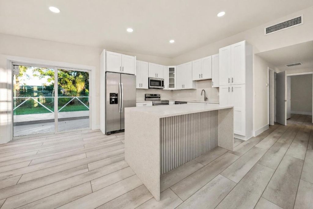 Photo of 6934 Tradewind Way, Lake Worth, FL 33462 (MLS # R11154474)