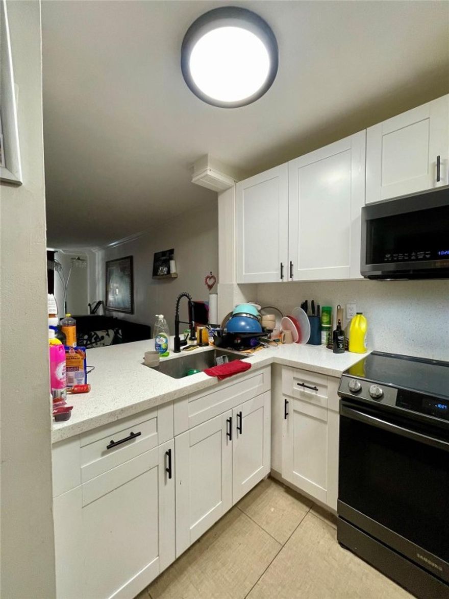 GREAT INVESTORS' OPPORTUNITY! Fully renovated first-floor unit with a nice terrace overlooking the pool area. Tenant on his 3rd year lease, paying $1850.Gated Community with a Security guard at the gate, two parking spots assigned. Amenities include a Laundry Room, Fitness Center, Olympic Pool, and Tennis Court. Centrally located - Minutes from Aventura Mall - Sunny Isles Beach.