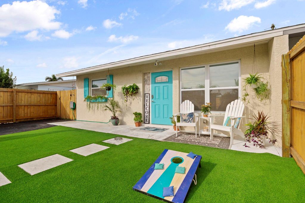 Photo of 402 SE Fini Drive, Stuart, FL 34996 (MLS # R10929954)