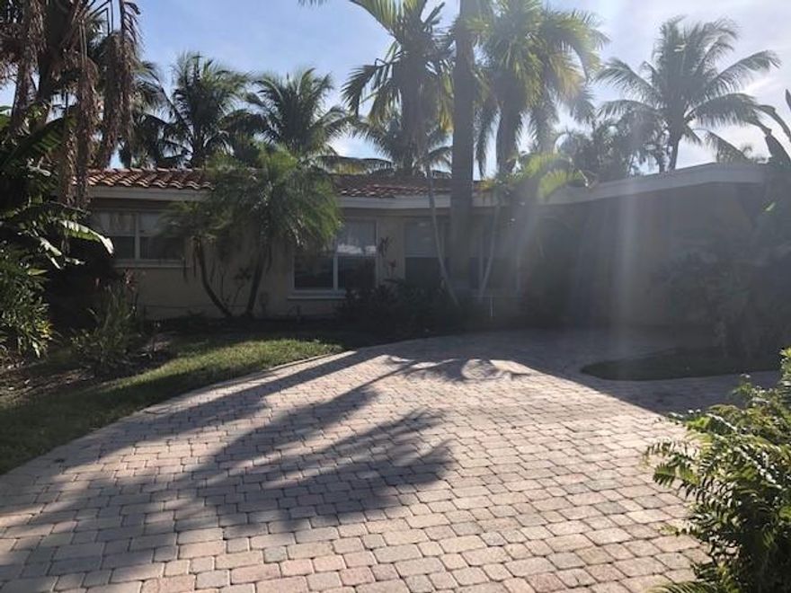 Nice 3 bedroom 2 bath 1 story home on the canal, ocean access.  Pavered circular drive,mature landscape, pool, great home for entertaining friends & family.