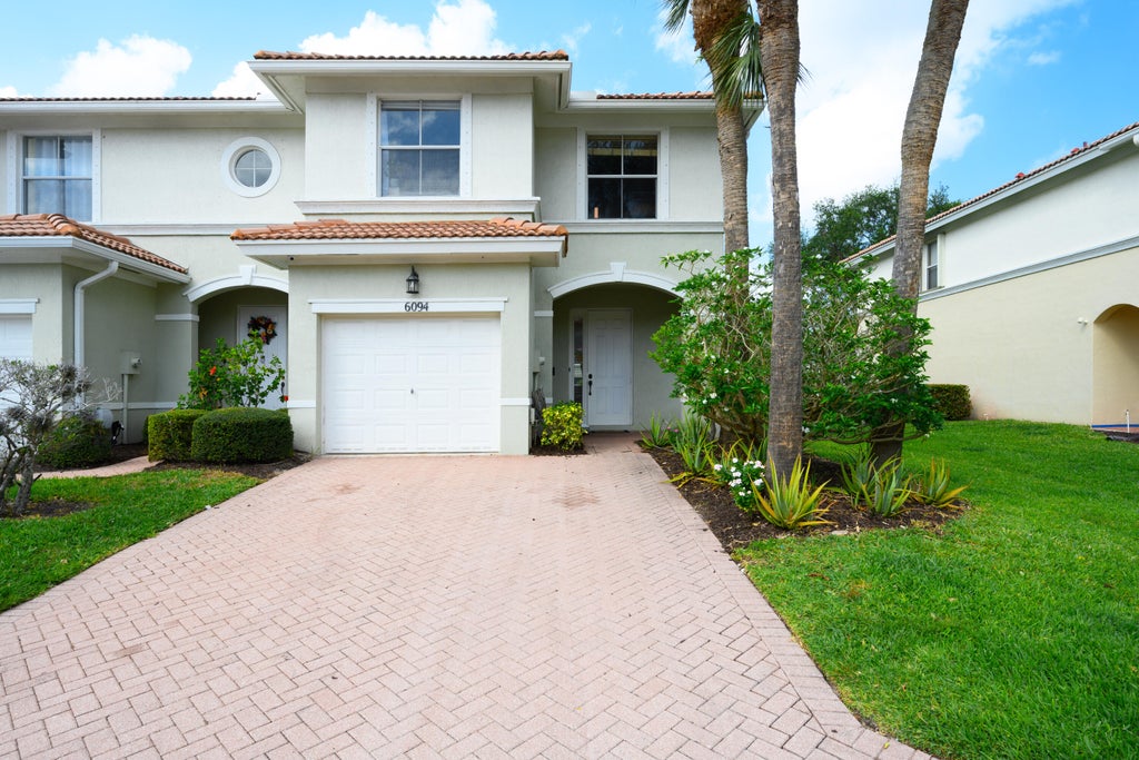 Photo of 6094 Seminole Gardens Circle, Riviera Beach, FL 33418 (MLS # R11076835)