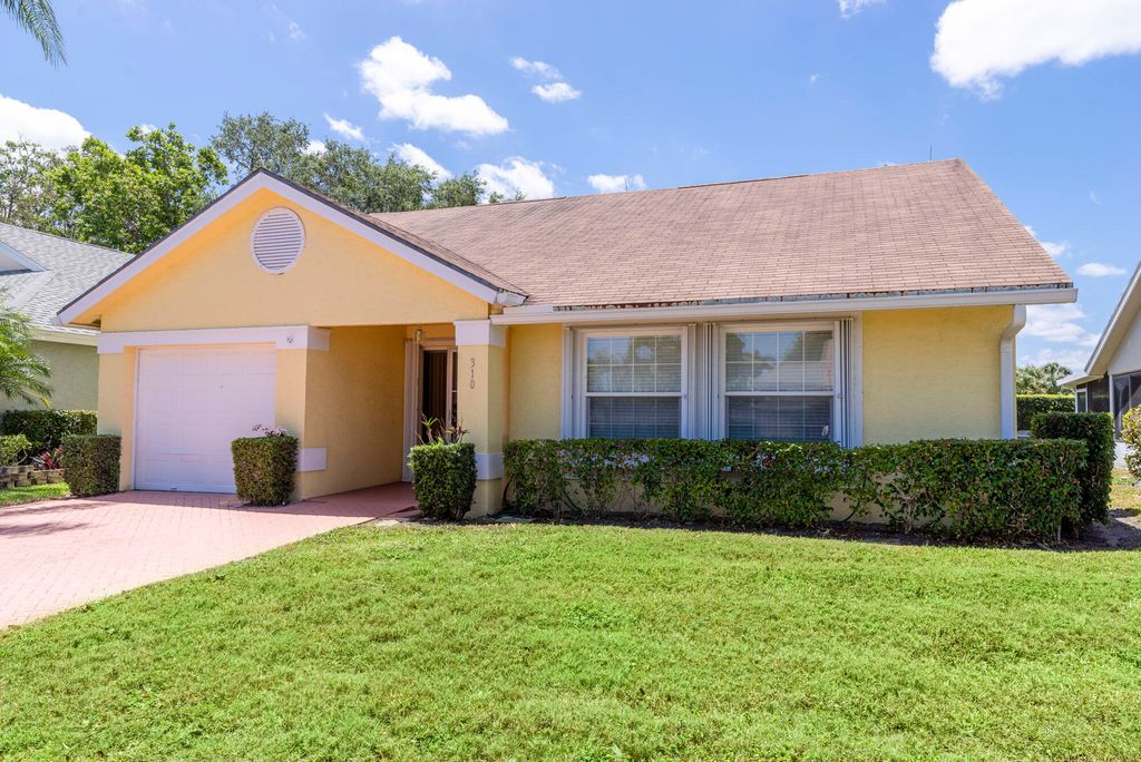 Photo of 310 Moccasin Trail W, Jupiter, FL 33458 (MLS # R10982169)