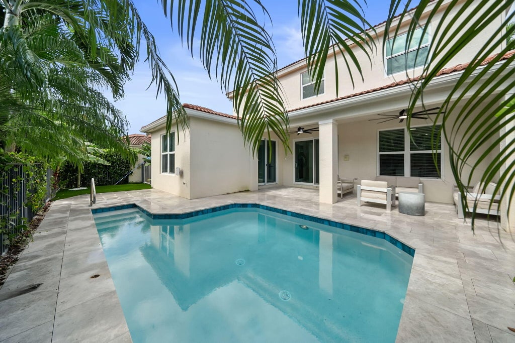 Photo of 147 Via Condado Way, Palm Beach Gardens, FL 33418 (MLS # R11079414)