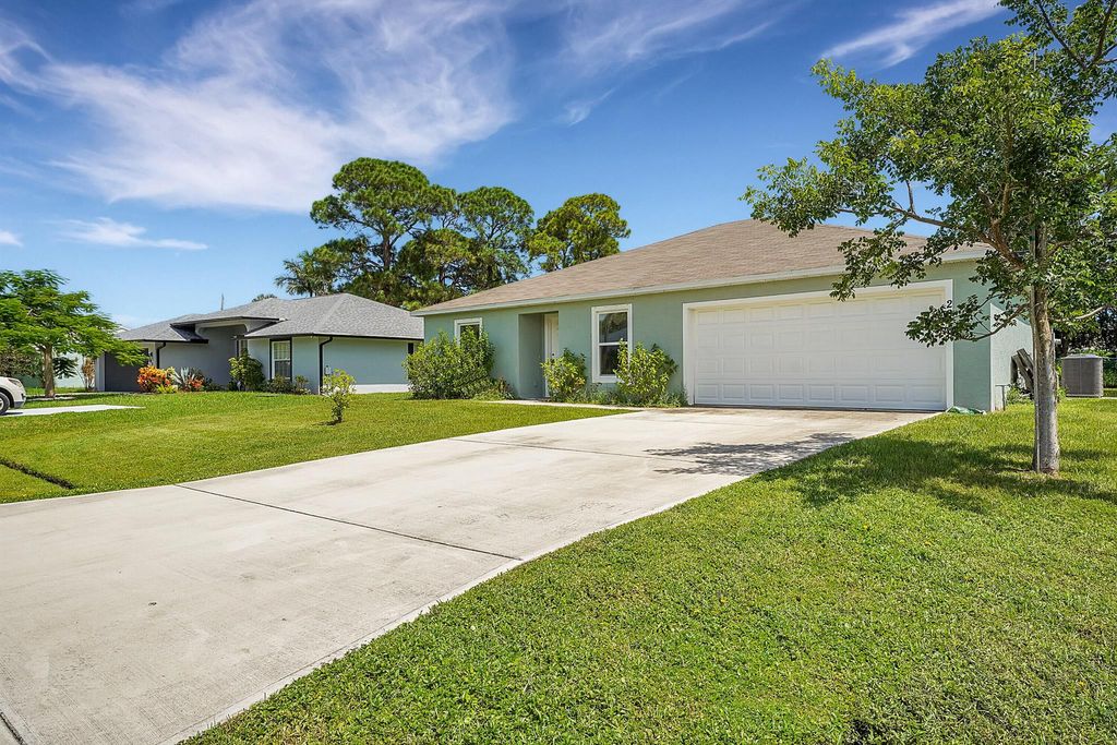 Photo of 2818 SE Rawlings Road, Port Saint Lucie, FL 34952 (MLS # R11019320)