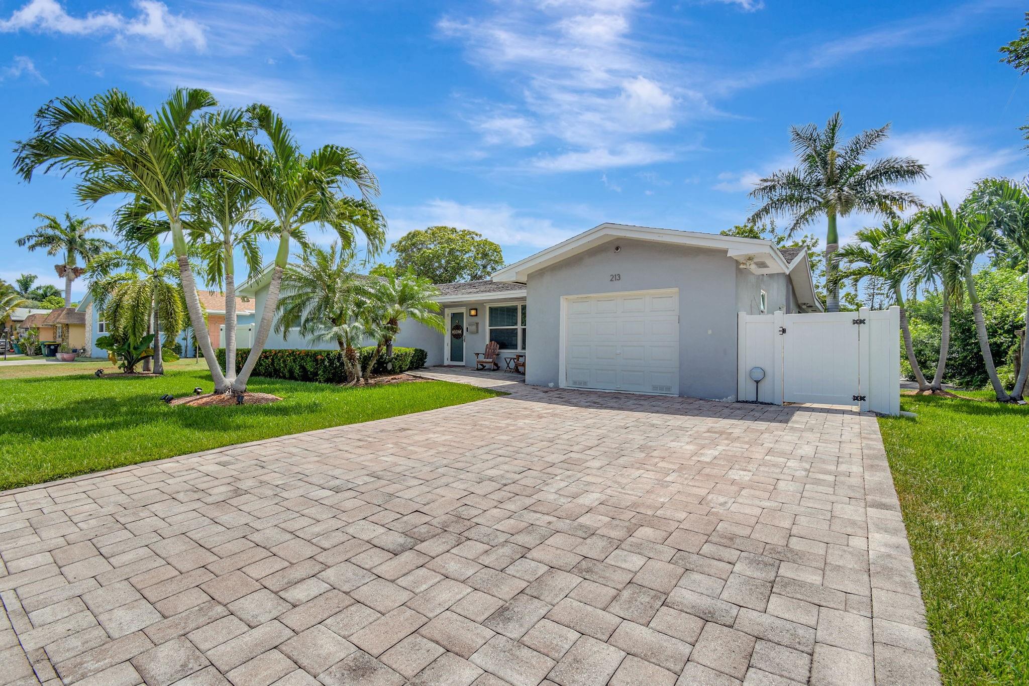 Welcome to this beautifully updated 3-bedroom, 2-bathroom single-family home located in the heart of Dania Beach! The open-concept living space is filled with natural light, creating a welcoming and airy atmosphere. The modern kitchen features sleek waterfall countertops, stainless steel appliances, and ample cabinetry, making it ideal for cooking and entertaining. Outside, the backyard is a private oasis, perfect for enjoying the Florida sunshine or hosting family and friends for BBQs and gatherings; with plenty of room for a pool.
Walking distance to Frost Park and minutes from Dania Pointe, this home offers the perfect blend of comfort, convenience, and coastal living.
impact throughout, tankless water heater, A/C 2017, Roof 2007