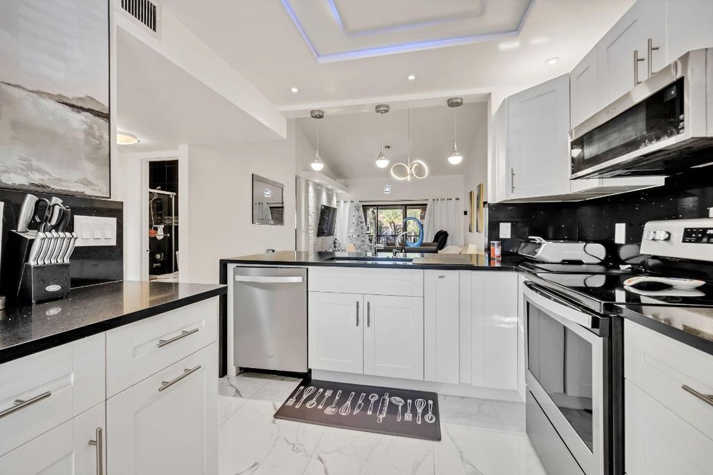 Photo of 4307 S Carambola Cir #2679, Coconut Creek, FL 33066 (MLS # F10539991)