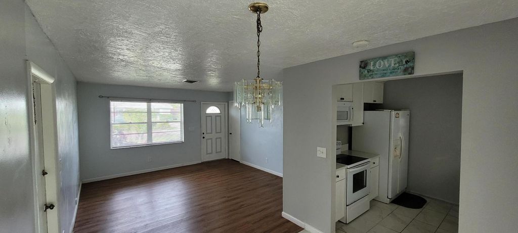 Photo of 351 W 21st Street, Riviera Beach, FL 33404 (MLS # R11152362)