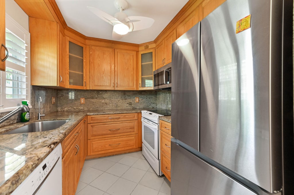 Photo of 129 Waterford F, Delray Beach, FL 33446 (MLS # B26074615)