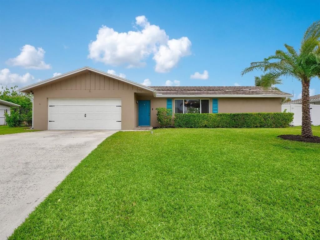 Photo of 9732 Dogwood Avenue Ave, Palm Beach Gardens, FL 33410 (MLS # R10697429)