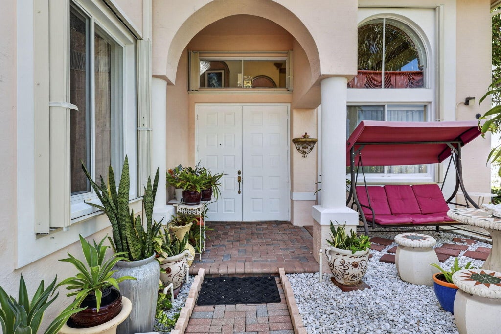 Photo of 120 ISOLA Circle, Royal Palm Beach, FL 33411 (MLS # B26063705)