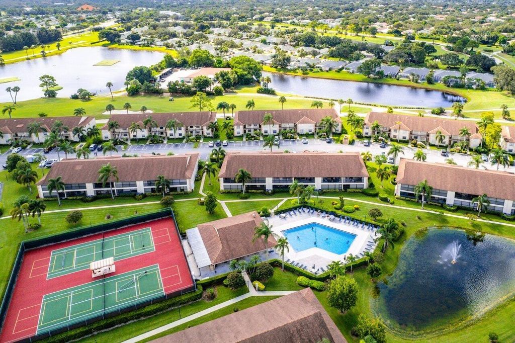 Photo of 1102 Pinecrest Circle #F, Jupiter, FL 33458 (MLS # R10914096)