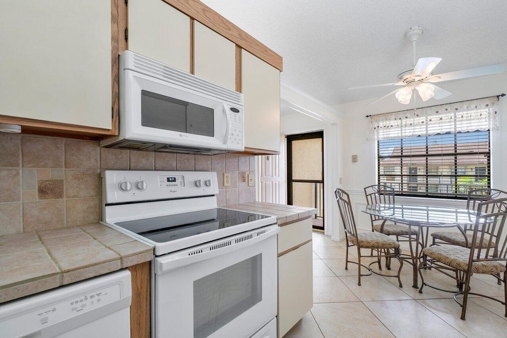 Photo of 1102 Pinecrest Circle #F, Jupiter, FL 33458 (MLS # R10914096)