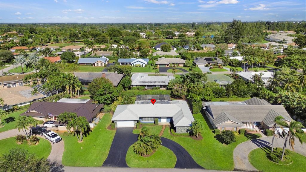 Photo of 236 Gleneagles Drive, Atlantis, FL 33462 (MLS # R10943341)