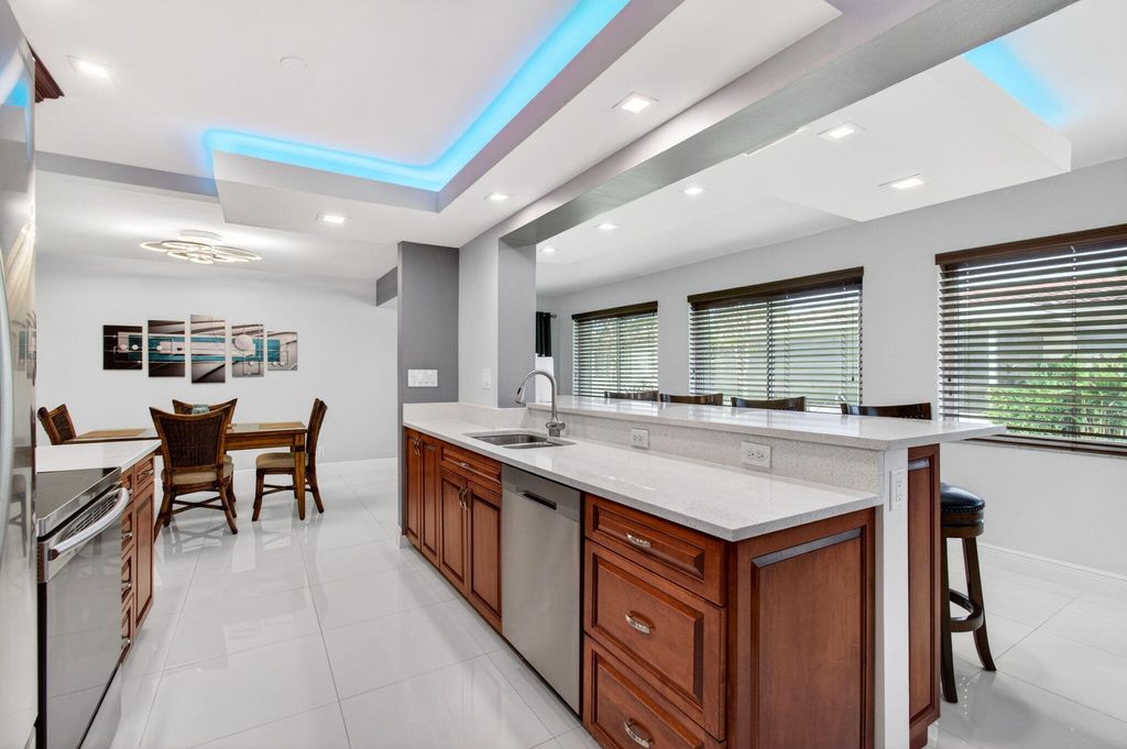 Photo of 1255 NW 44th Street, Deerfield Beach, FL 33064 (MLS # B26018011)