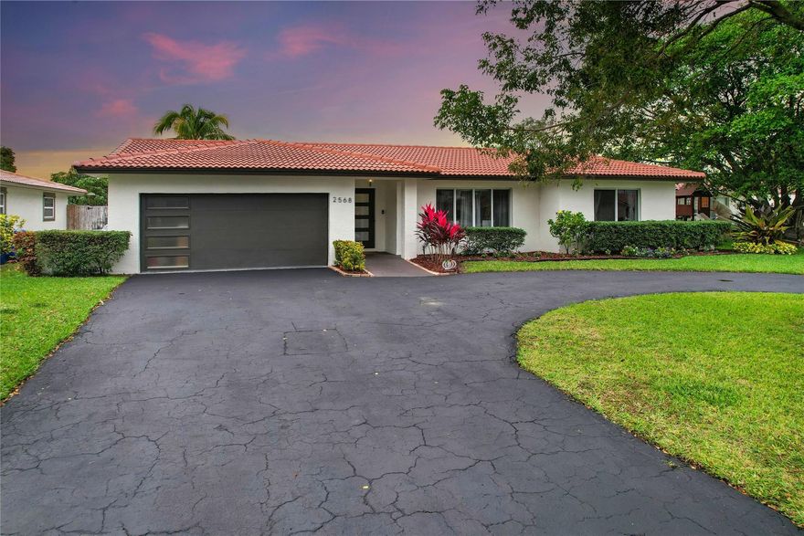 Completely remodeled Waterfront home. The attention to detail here is awesome with over $200k in upgrades & improvements. Italian tile, Recess lights thru-out, Large open kitchen w/ qrtz cntrs, cust cabinetry w/ hidden outlets, Dbl wine cooler, Top of the line new appliances, Island induction cooktop w/ ceil vent, built in micro, Refrig w/ flex, Bosch 800 series. Master has solid wd frch doors, walk in clst. Mast bath has Qrtz, dbl sink, touch light mirrors, porcelain tile in huge glass shower- auto temp ctrl. 3 bedrms are large w/dbl clsts+org & fans. 2nd bath, cabana w/ 6' soaker tub/shower w/temp cntrl, qrtz , NEW, A/C, W/H, ELEC panel & box, 5 clng fans, impact Drs+wndws.  Salt-water heated pool, Led lights, Trav stn patio. od lght. Trop trees & more...designed to be your lovely home.