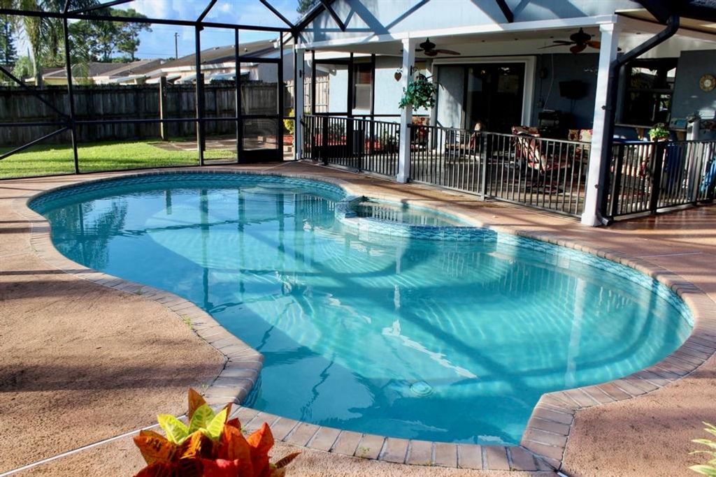 Photo of 2161 SE Midtown Road Rd, Port Saint Lucie, FL 34952 (MLS # R10818595)