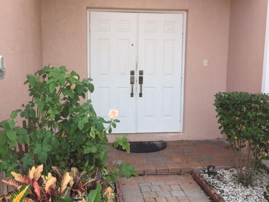 Guest bedroom and full bathroom downstairs. Accordion shutters upstairs so no need for ladders. And here's some of what the association provides in the dues: cuts your grass, front and back, as well as takes care of your sprinkler heads as needed, basic cable and HBO, paints the exterior of the house, maintains the Clubhouse with a pool and the community is gated. Thats value folks. If you're looking for a house to call home in Pembroke Pines where you can access I-75, 595, Turnpike, Ft Lauderdale International airport, Miami International Airport, Sawgrass Mills mall, and on and on in minutes...search is over, decision is made. Question is: are you going to let someone else buy it before you? Come see it now before interest rates go higher.
