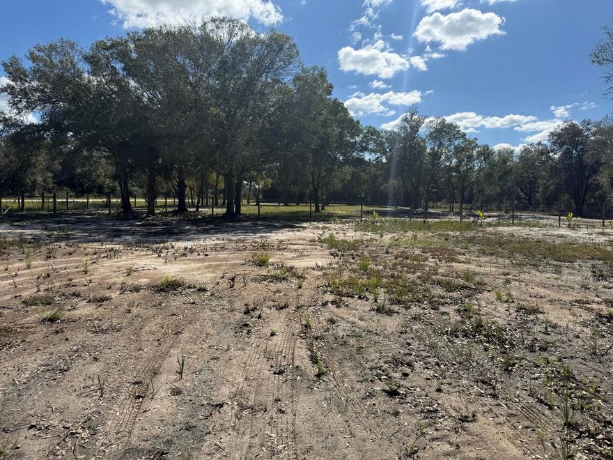 Discover this beautiful 1.25-acre cleared corner lot in the peaceful Viking/Prairie area of Okeechobee! This fully fenced property comes ready for your vision with a survey completed, culvert already installed, and power available right at the road. The land features its own private pond, adding charm and natural beauty, along with a gazebo perfect for relaxing and enjoying the quiet surroundings. A well is already on the property, giving you a valuable head start for future use. With a gated entrance, excellent access, and plenty of space, this parcel is ideal for a weekend getaway, recreational use, or a future homesite. Don't miss this well-prepared and attractive 1.25-acre property in a growing rural community!