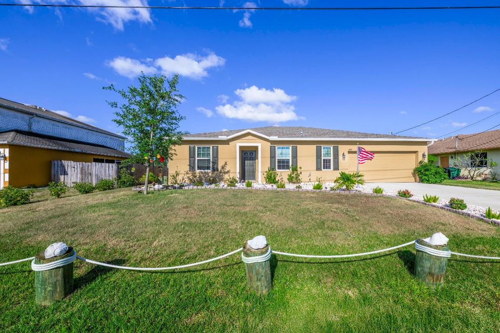 Photo of 4042 SW Jaqust Street, Port Saint Lucie, FL 34953 (MLS # R11134400)