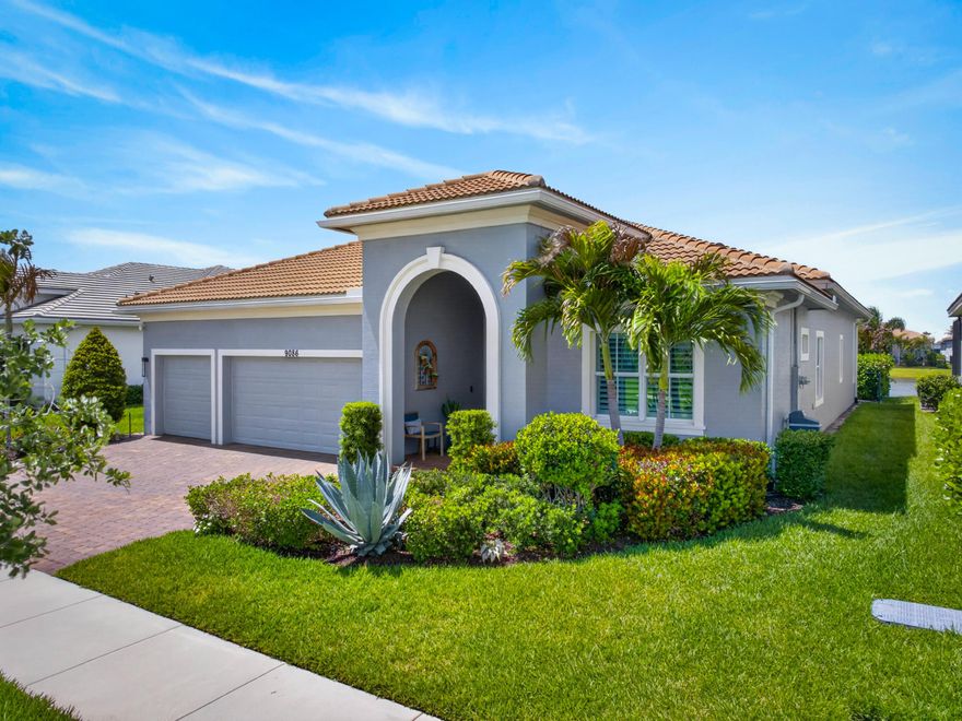 GORGEOUS LANDSCAPED BACKYARD w/artificial turf trees shrubs flowering beds paver & landscape lighting, complemented by an 11' x 29' pool and spa wit, summer kitchen with privacy wall, outdoor hot water shower, and fully fenced oversized yard. Interior upgrades include gourmet kitchen with wall oven and stainless steel chimney hood, quartz countertop drop zone, and solid-core interior doors. Primary bedroom features cabana door with direct lanai access. Additional features include driveway, lanai, and yard pavers resealed in 2025, three-car garage with epoxy floor coating, whole-house water filtration and conditioning system, two rear hard-wired surround sound speakers in great room ceiling, Pottery Barn light fixtures incl foyer chandelier, plantation shutters & additional win treatments