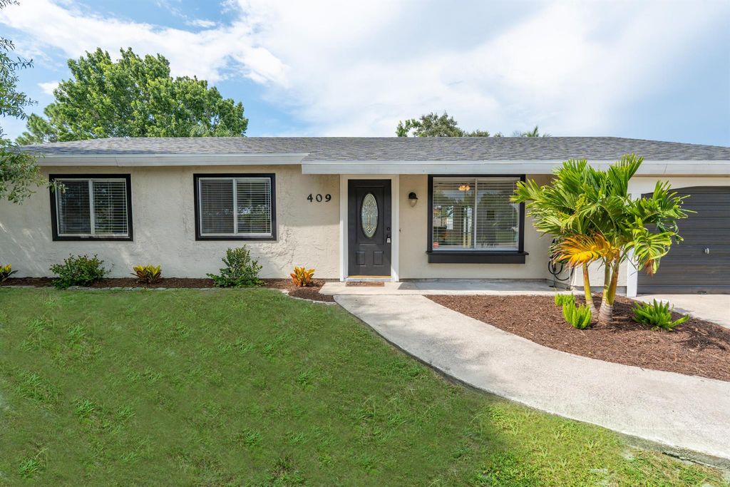 Photo of 409 SW Eastport Circle, Port St Lucie, FL 34953 (MLS # R10902743)