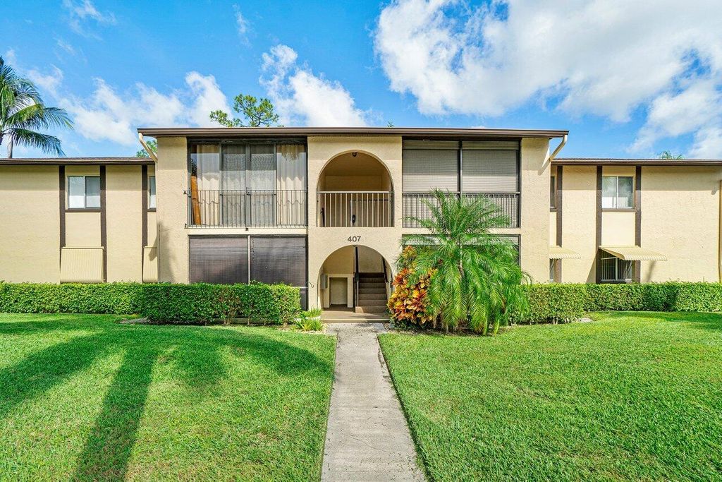 Photo of 407 Pine Glen Lane #B-1, Greenacres, FL 33463 (MLS # B26030107)