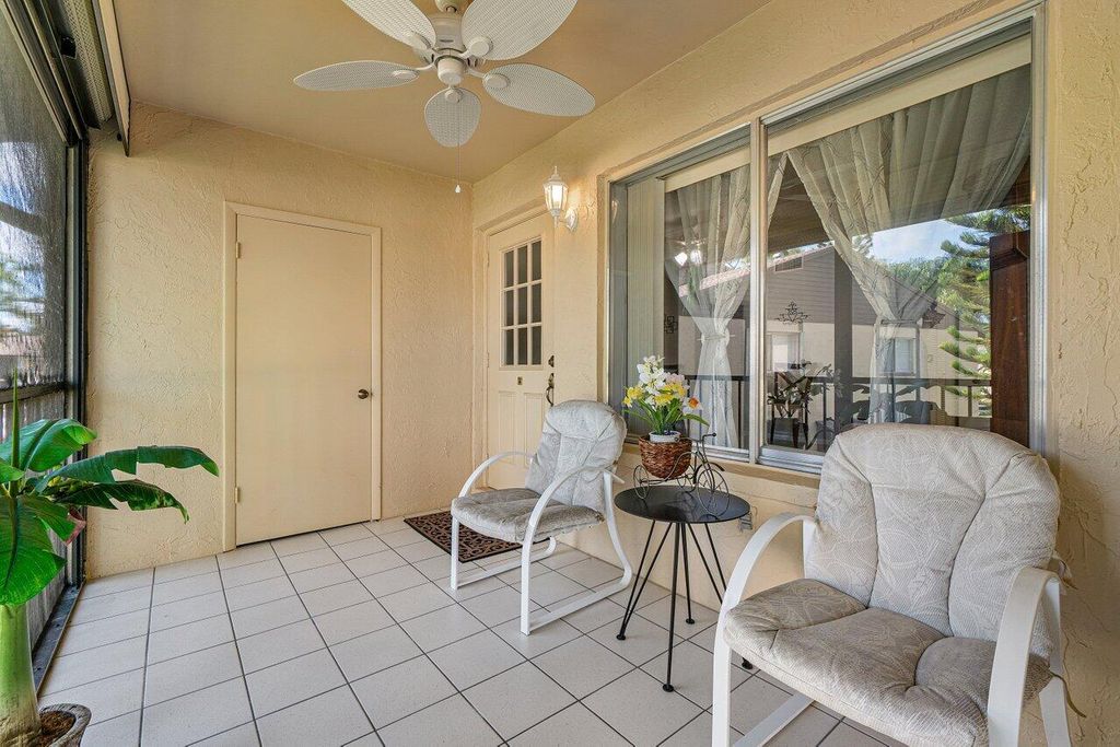 Photo of 407 Pine Glen Lane #B-1, Greenacres, FL 33463 (MLS # B26030107)
