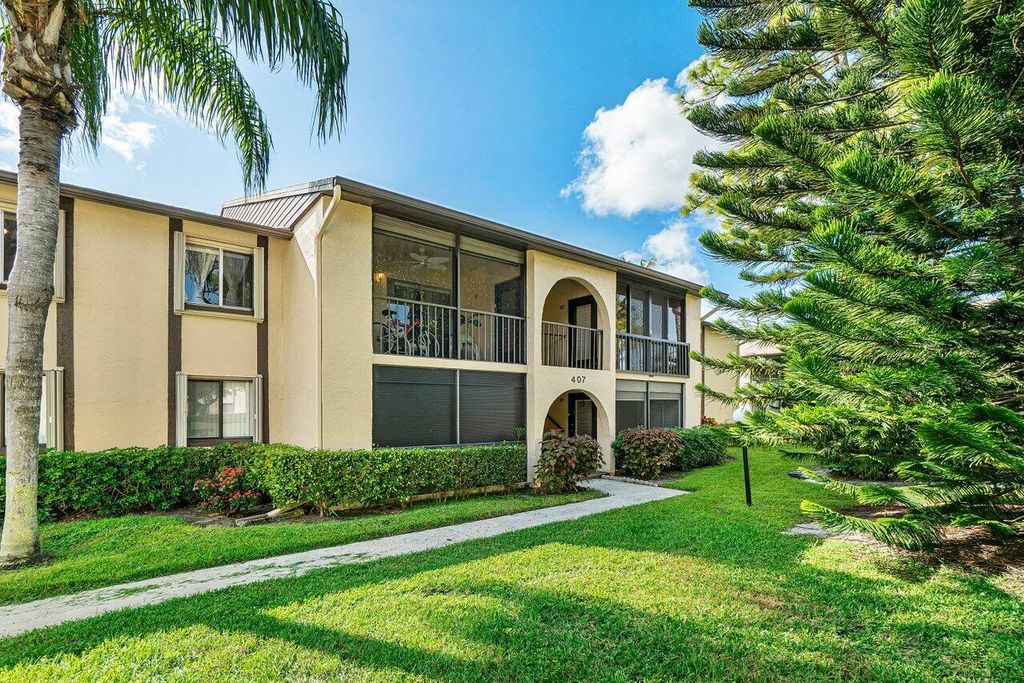 Photo of 407 Pine Glen Lane #B-1, Greenacres, FL 33463 (MLS # B26030107)