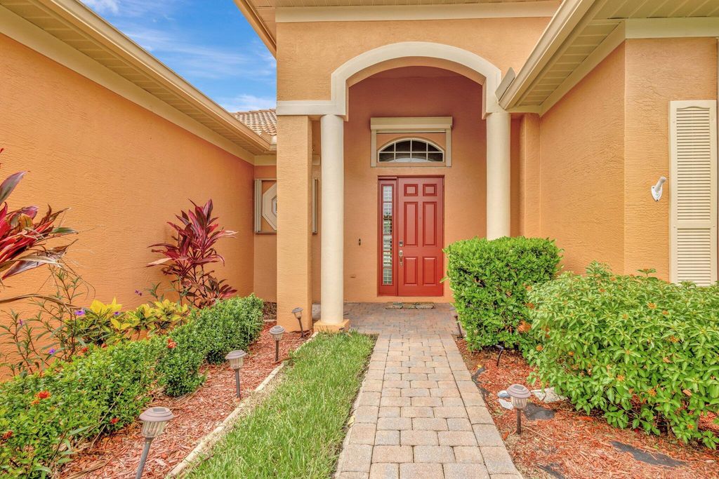 Photo of 303 NW Cheshire Lane, Port Saint Lucie, FL 34983 (MLS # R11101884)